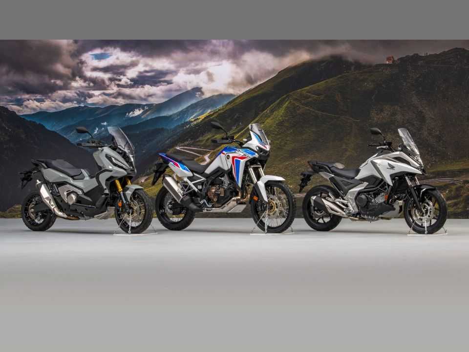 Honda X-ADV 2021 (esq.) e Honda NC750X 2021 (dir.) ao lado da Africa Twin Honda X-ADV 2021 (esq.) e Honda NC750X 2021 (dir.) ao lado da Africa Twin