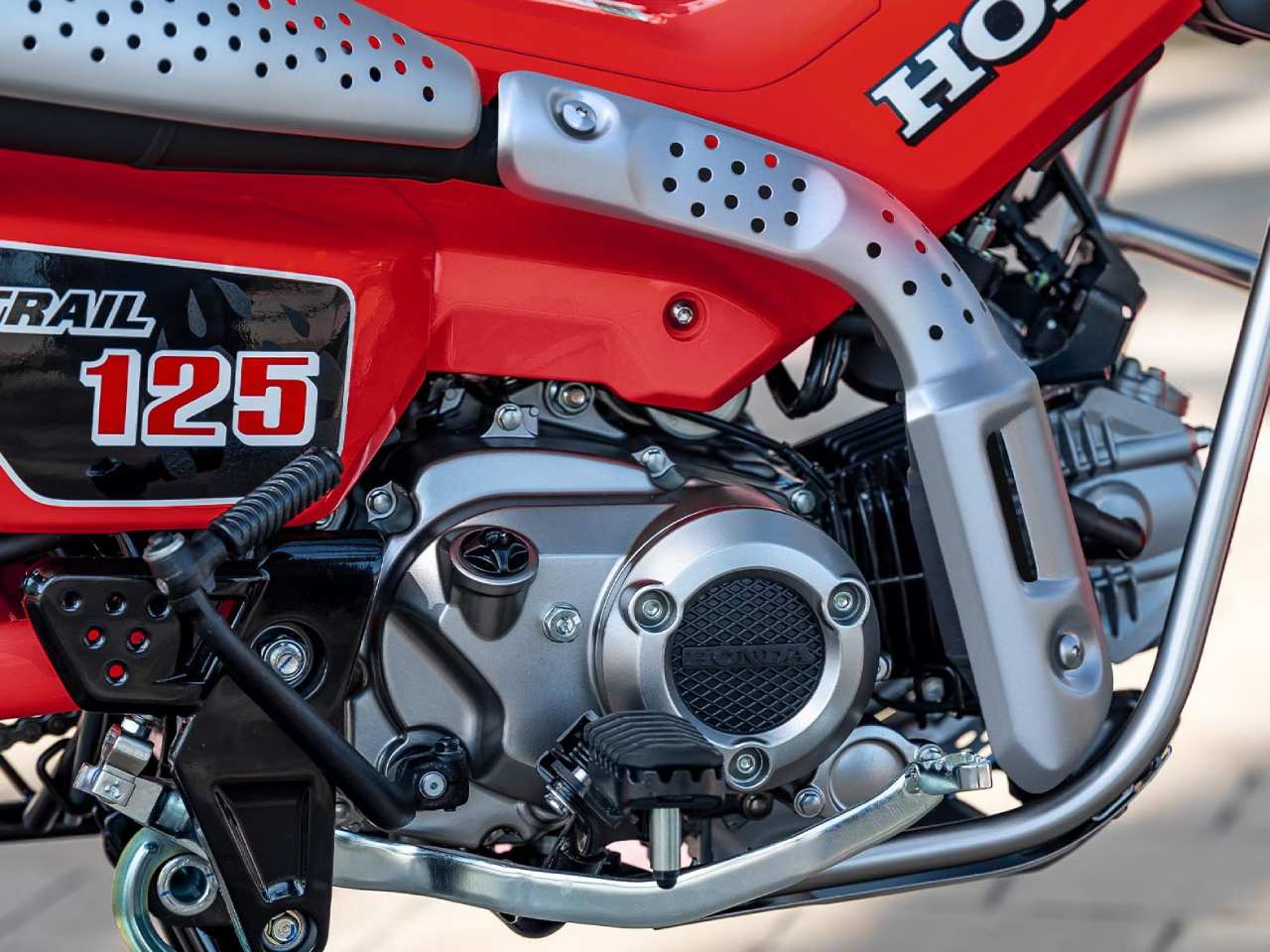 Honda�Trail 125 2025 - lateral